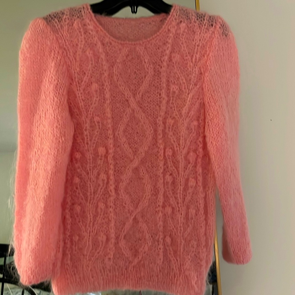 Pink, soft, loose knot sweater